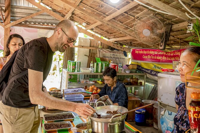 Small-Group Mekong Delta Day Trip: Boat Ride, Cottages & Pagoda - The hand-rowed boat through narrow canals
