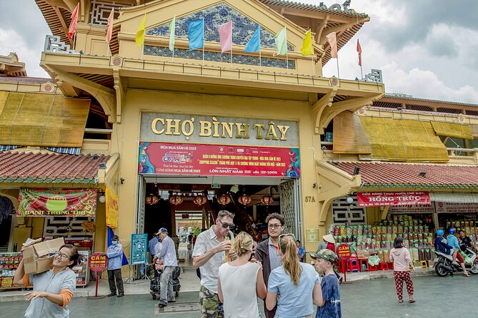Small-group Saigon City Tour: 3-Hour Cyclo Ride to Hidden Stories - The cyclo ride into District 5