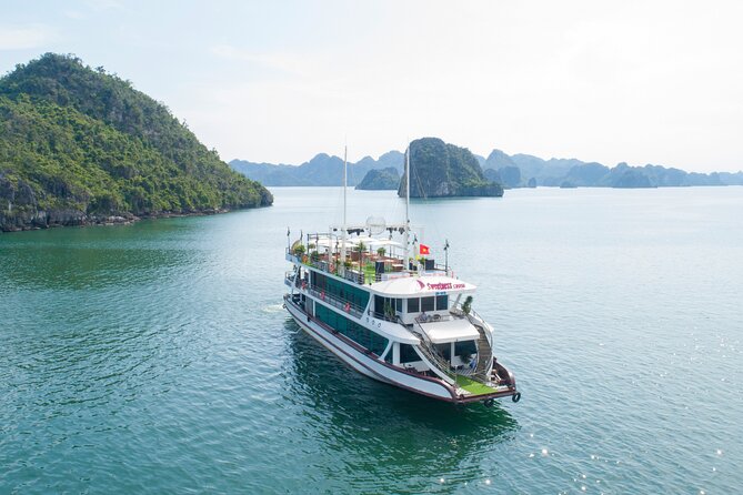 Sweetness Cruise Ha Long Bay: Caves, Kayaking, Swimming & Lunch - Boarding the cruise and settling in