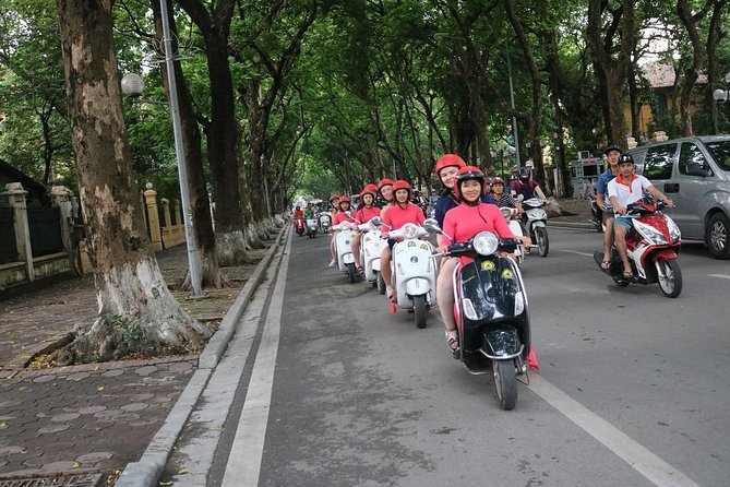 Vespa City Tour &Train Street Female With Ao Dai Riders 4,5 Hours - Long Bien Bridge and the Red River side of Hanoi