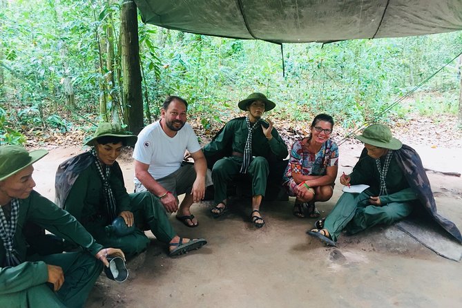 VIP Tour Cuchi Tunnels & Mekong Delta Cruise Full Day Group 12pax - Entering the Cu Chi Tunnels for three hours